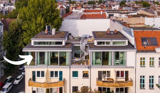 Aufstockung eines Bungalows auf einem Mehrfamilienhaus