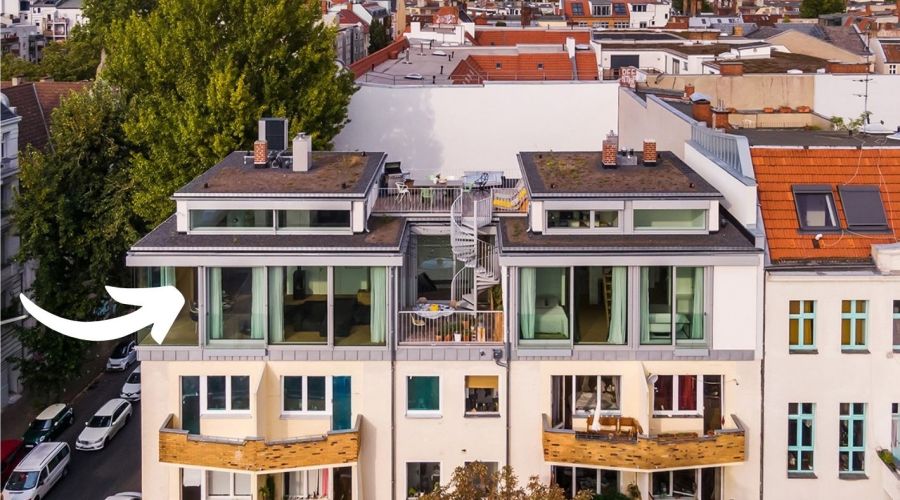 Aufstockung eines Bungalows auf einem Mehrfamilienhaus